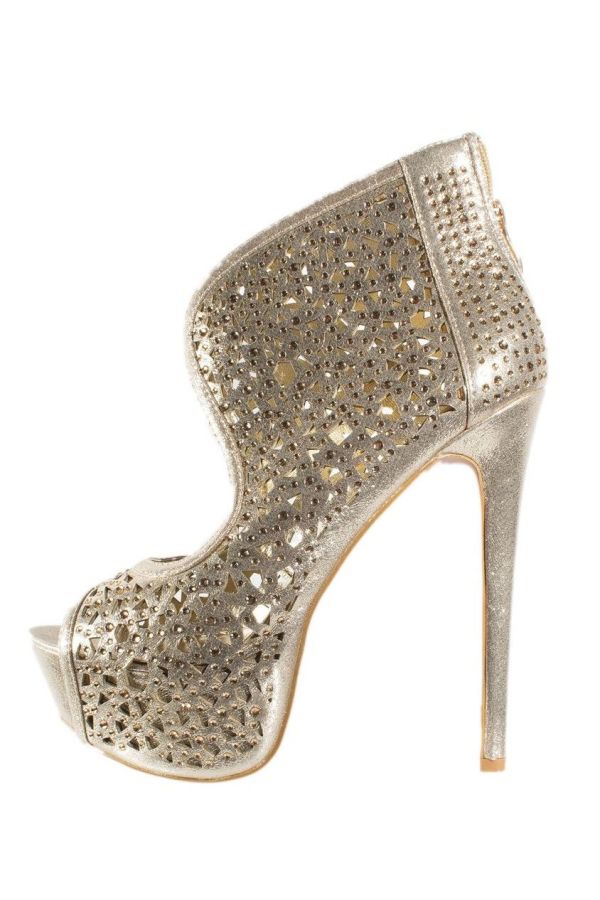 exclusive high heel perforated gold sandals.